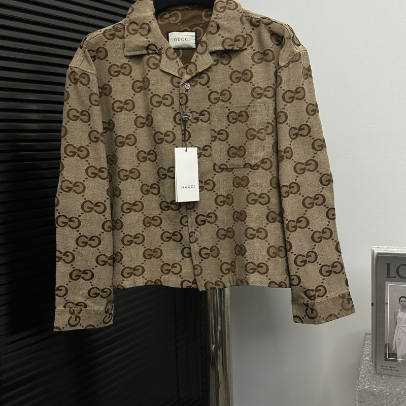 G*u*i coats
